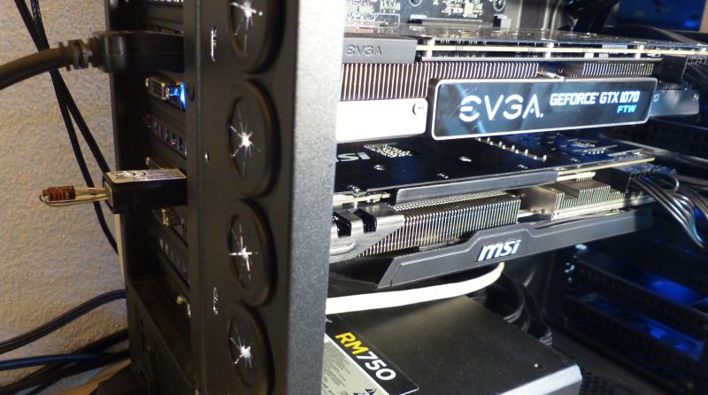 The HDMi-VGA dongle connected to the graphics card
